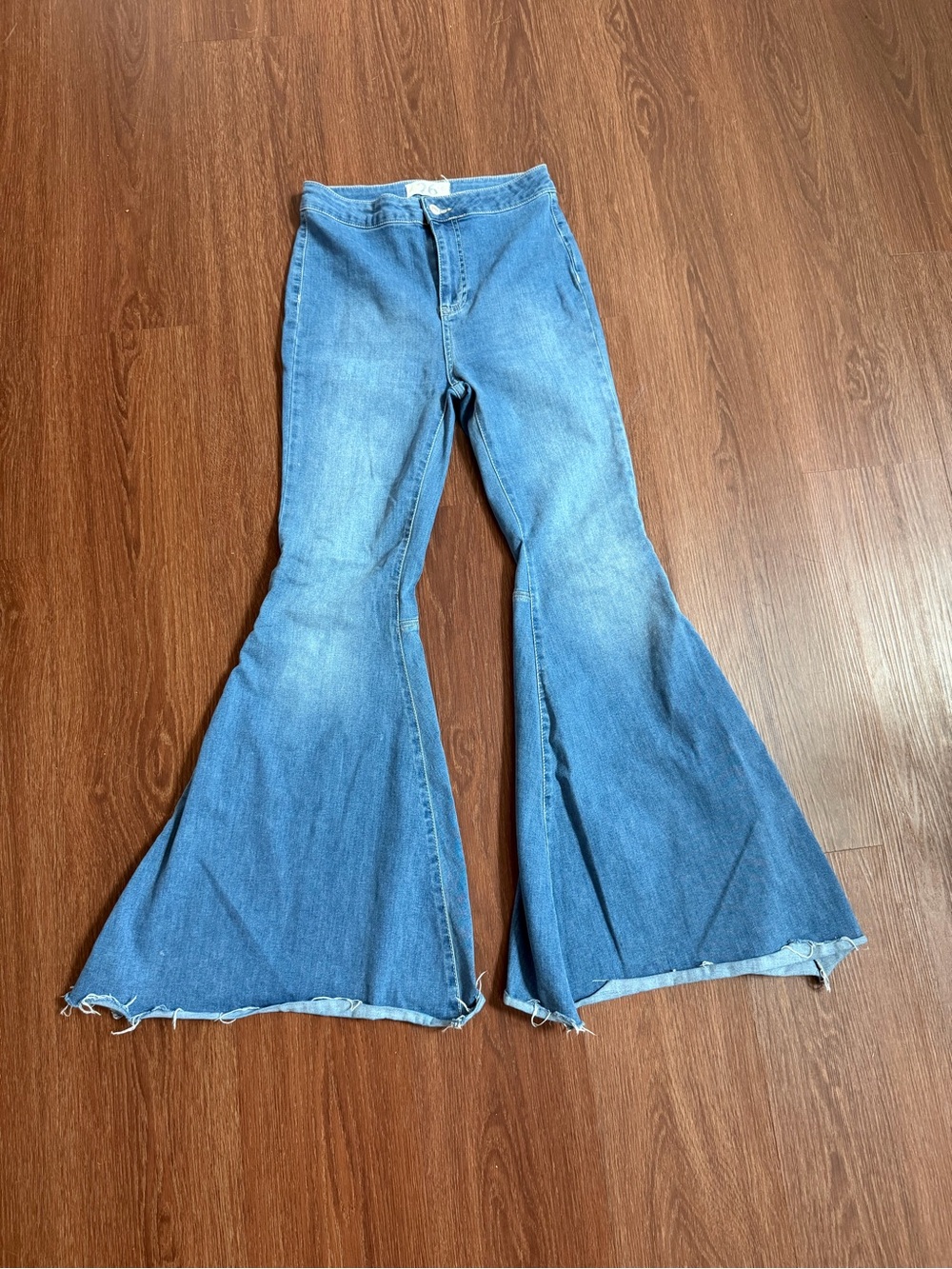 High-Waist Blue Flare Raw Hem Women’s Jeans